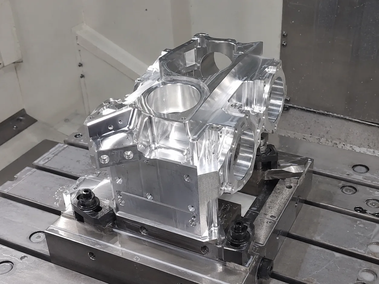 Aluminium gearbox housing on a 5-axis CNC machining centre — EKINSUN