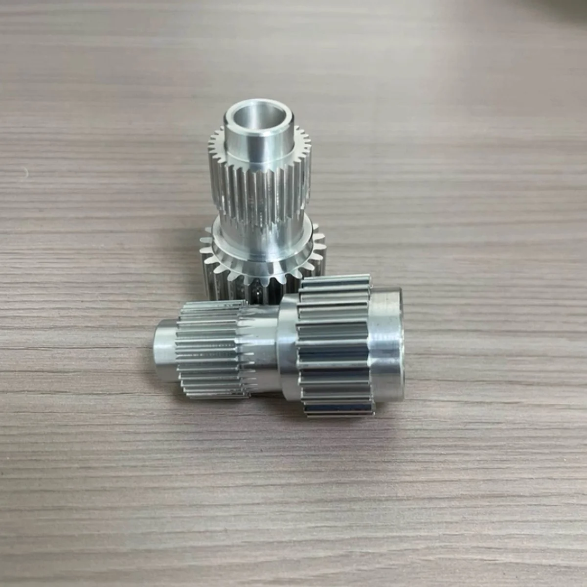 Remade machine gear and shaft assembly reproduced by EKINSUN from worn original parts