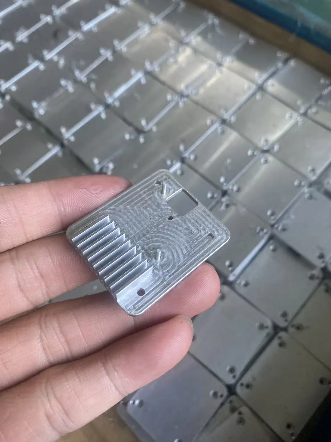 Custom CNC machined aluminum heat sink with integrated cooling fins and a milled electronics pocket — EKINSUN