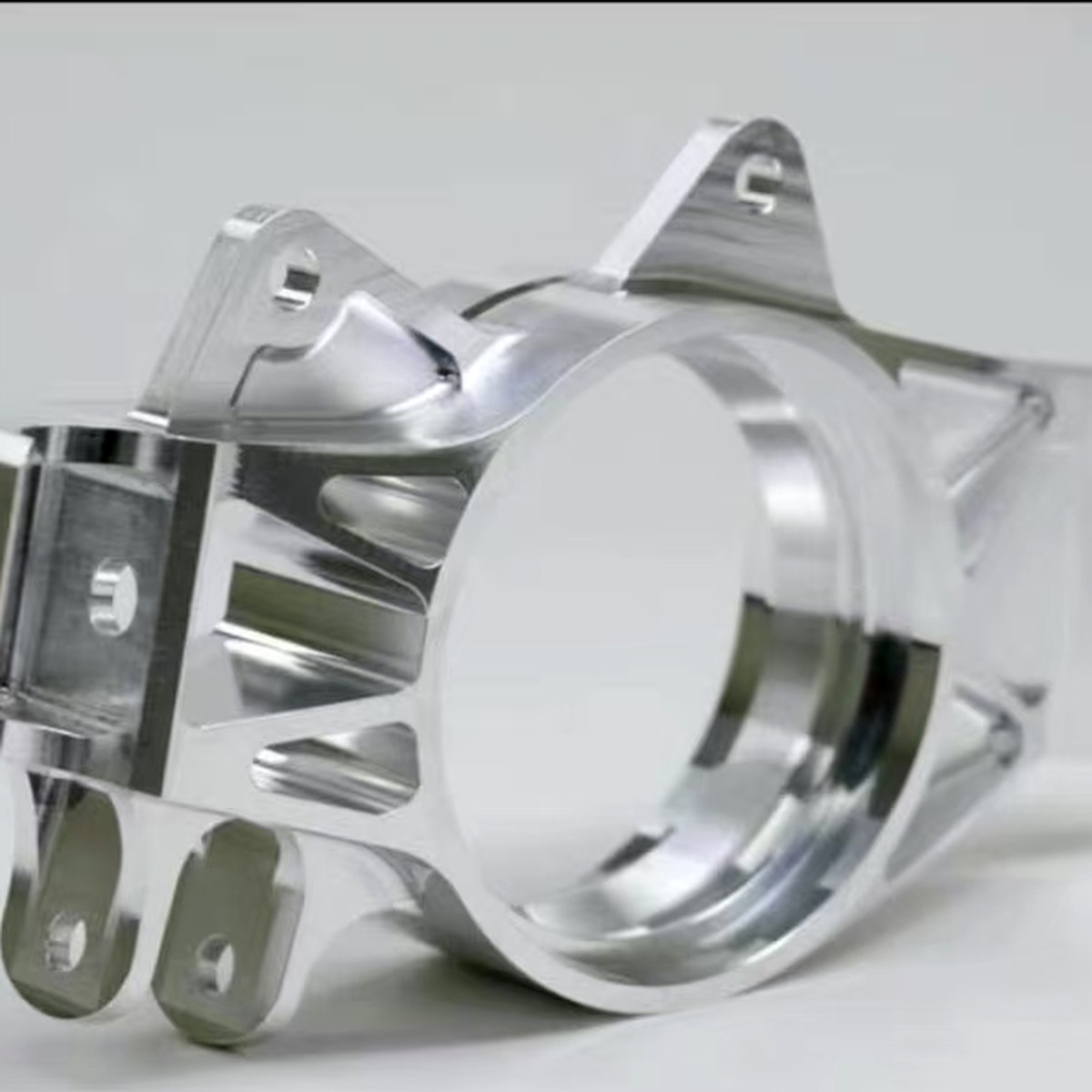 CNC Aluminum Motor Clamp Mirror Finish — EKINSUN custom manufacturing case photo