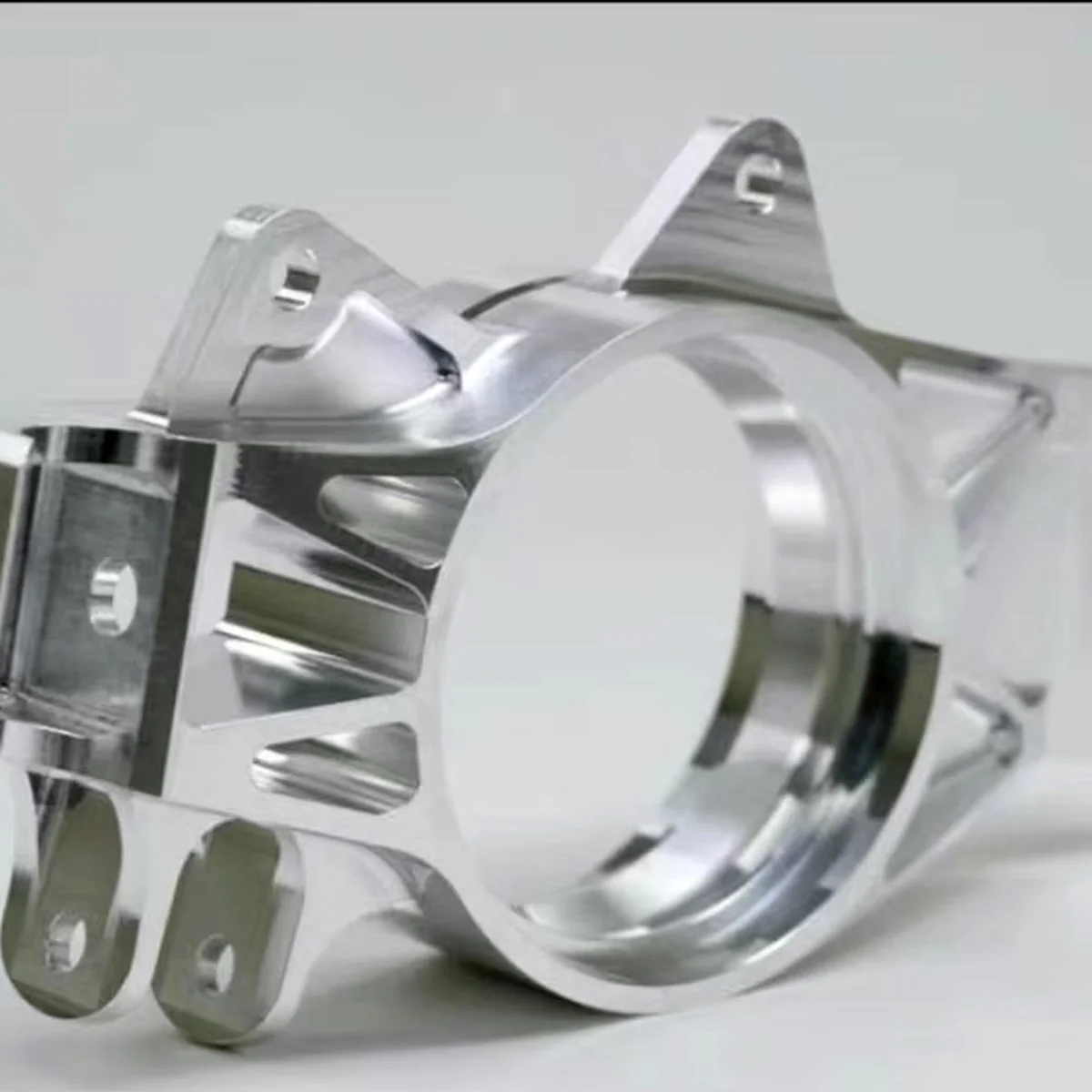 CNC Aluminum Motor Clamp Mirror Finish — EKINSUN custom manufacturing case photo