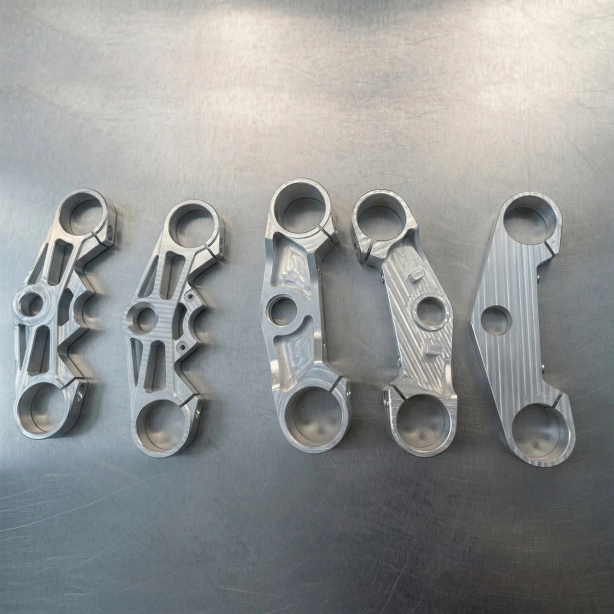 Billet aluminium motorcycle triple clamp CNC machined by EKINSUN